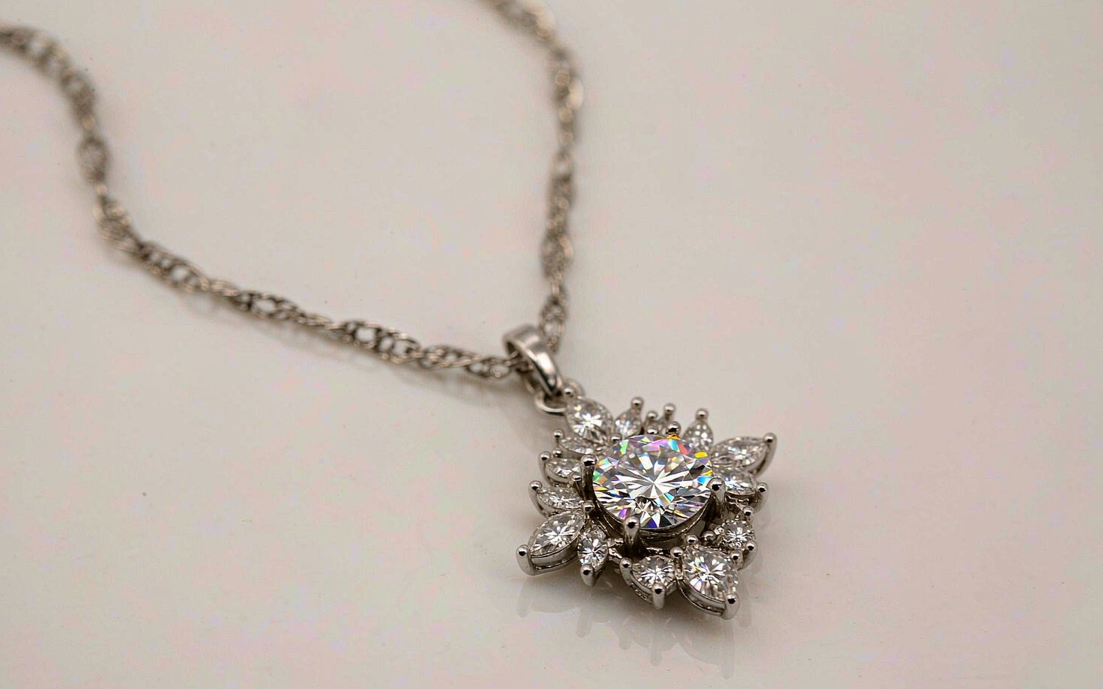 Solitaire pendant necklace with a brilliant stone on a thin chain